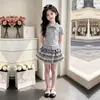 Moda para Niñas 2026 Estilo Universitario a Rayas Manga Corta Dulce Lindo Adorno de Encaje Falda Pastel Elegante Conjunto de Dos Piezas