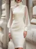 Vestido de malla con retazos estilo europeo y americano 2026, vestido ajustado de cuello alto con mangas abullonadas, vestido de noche para mujer