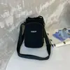 Bolsa Cuadrada Pequeña de Nailon con Cordón Casual Estilo Coreano para Mujer 2025 Nuevo Estilo Simple Portátil Cruzada Bolsa para Teléfono Móvil Versátil Bolsa para Viajero
