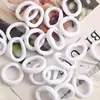 100 piezas precio multicolor infantil 3CM anillo de toalla nylon no daña el cabello Tamaño pequeño anillo para el cabello Fábrica venta al por mayor
