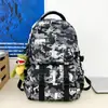 Mochila Camuflada para Homens e Mulheres, Grande Capacidade, Moderna, Leve, Mochila Casual para Viagem, Mochila Escolar para Estudantes Fashion e Versátil