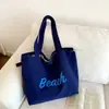Bolso de hombro cruzado de lona simple y casual estilo coreano con estampado de letras, bolso tote versátil de gran capacidad para estudiantes y para ir al trabajo