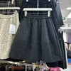 Falda midi de lana mezclada, minimalista y a la moda, con adornos de pedrería, estilo coreano, para mujer, colección otoño 2026, corte holgado, falda versátil de retazos en línea A