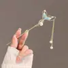 Novo estilo chinês estilo antigo andar Tassel Fishtail Niche Design Hairpin High-end Sentimento Disco de Cabelo Hairpin personalizado acessórios de cabelo para as mulheres