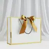 Embalagem de Compras Laço de Presente Sacola de Papel Espessa com Estampagem a Quente em Estoque Comércio Exterior Transfronteiriço Fabricante de Impressão Frete Grátis