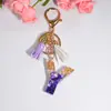 Nova Chaveiro de Letra com Pingente de Gota de Cristal Roxo Joia de Resina Pingente de Franja para Bolsa Presentes Europeu e Americano