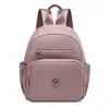 Bolsa de ombro dupla de nylon feminina 2026 novo estilo moderna à prova d'água mochila feminina verão grande capacidade bolsa de viagem de lona