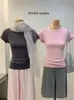 WGWE9278 Guangzhou Treze Hong Roupas Femininas 2026 Novo Estilo Coreano Gola Redonda Ombro Normal Cintura Marcada Manga Curta Camiseta Top Verão