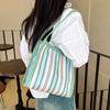 2025 Estilo Coreano Casual Sensación Gran Capacidad Raya Vertical Moda Estilo Occidental Portátil Bolso de Mujer Nueva Llegada Bolso de Hombro Portátil para Mujer