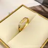 Anillo clásico estilo Chanel con patrón de rombos Coco, oro de 18 quilates con diamantes, anillo de pareja versátil de lujo ligero de alta gama, ins