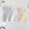 Calcetines para niñas Yishuangshuang, nuevos calcetines de otoño e invierno con forma de corazón de dibujos animados hasta la mitad de la pantorrilla, algodón peinado, calcetines estilo Miu con letras y caras sonrientes para estudiantes
