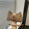 Bolso de Axila para Mujer Otoño e Invierno 2025 Nueva Moda Diseño de Nicho Bolso de Hombro de Gama Alta Retro Bolso Cuadrado Pequeño para Viaje