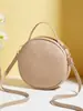 2025 Nova Moda Elegante Exquisito Elegante Em Relevo Forma de V Cor Sólida Ombro Único Transversal Bolsa Pequena Redonda Fábrica Atacado