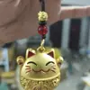 Colgante de gato de la suerte hueco de plata imitación vintage de Xizang cadena larga para suéter accesorio de llavero venta al por mayor