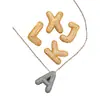 Colgante de letra inglesa 26 con incrustaciones de circonita de cobre transfronterizo, letra gruesa de moda popular, accesorios DIY al por mayor