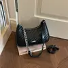 Bolsa Feminina de Axila 2026 Nova Moda de Verão Tendência High-End Vintage Nicho Luxo Leve Bolsa de Ombro Transversal