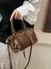 Bolso de mano tipo almohada de alta moda retro para mujer, nuevo estilo otoño e invierno 2026, bolso de hombro elegante, bolso cruzado versátil para el día a día