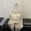 Tendencia Transfronteriza de Borlas 2026 Nuevo Estilo Bohemio de Gamuza Elegante y Único Bolso Cruzado de Hombro Tachonado