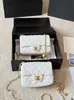 Bolso de cadena de cuero genuino de venta caliente transfronteriza, cuadrado, rombo, bola de oro pequeña, versión alta, estilo Coco, de un solo hombro, cruzado, para mujer