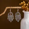 Pendientes Geométricos de Flor Europeos y Americanos Transfronterizos para Mujer, Estilo Étnico Retro, Temperamento Artístico, Pendientes de Borla Personalizados, Venta al por Mayor de Joyería