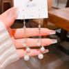 Pendientes de borlas de perlas de moda de estilo japonés y coreano para mujer, de alta gama, con gran temperamento, largos, con destellos de diamantes, moda de Internet, pendientes rojos