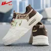 Zapatillas para hombre Huili 2026 otoño nuevo de moda cómodas de cuero zapatos casuales para estudiantes versátiles ligeros zapatos de suela blanda