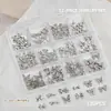 Acessórios para Nail Art Caixa com 12 Compartimentos Borboleta de Metal Misto Coroa Coração Cruz Fita Laço Decoração de Unha com Formato Especial