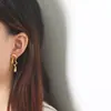 Pendientes de Titanio Retro Versátiles de Moda para Mujer, Geométricos tipo Líquido de Lujo Ligero Temperamento Pendientes de Personalidad Otoño e Invierno