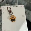 Llavero Capibara Codicioso Lindo Colgante para Mochila Escolar de Estudiante Colgante para Mochila de Niña Dibujo Animado Regalo para Mejor Amigo
