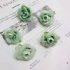 Tela de seda de simulación directa de fábrica 4cm Cabeza de rosa con hoja rosa pequeña accesorios de producción DIY flores decorativas para boda