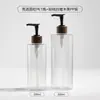 Frasco de Pressão Cilíndrico 500ml para Hotel Transfronteiriço Frasco Recarregável Frasco de Loção Pet Marrom Frasco de Gel de Banho Frasco de Shampoo