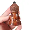 Estatua Pequeña de Buda Tathagata Tallada en Sándalo Rojo Hoja Pequeña Sakyamuni Pieza de Mango Colgante Artesanal Talla de Madera