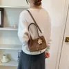 Bolso tote pequeño retro translúcido transfronterizo con charm dulce, bolso cruzado para mujer, bolso cuadrado pequeño de mano casual, bolso de hombro