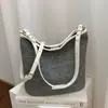 Bolso cubo tejido de estilo coreano vintage transfronterizo para mujer, nuevo y moderno bolso de mano versátil para el verano 2026, bolso de hombro, bolso cruzado