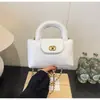 Bolso versátil de rombos de diamantes de alto valor transfronterizo bolso pequeño para mujer nueva moda cadena de lujo ligero bolso de un solo hombro cruzado de cuerpo bolso moderno