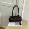 Bolso tipo baguette francés de nicho nuevo transfronterizo de lujo ligero, de alta gama, horizontal, versátil para el trabajo, de mano, de un solo hombro, para llevar bajo el brazo