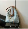 2026 Bolso de Hombro Grande de Gran Capacidad para Viajes Diarios para Mujer Nuevo Bolso de Hombro con Lazo Primavera y Verano Bolso Tote Casual de Mezclilla