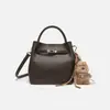 Bolso Cesta Cubo Estilo Nuevo 2026 con Patrón de Lichi para Mujer, Bolso de Mano Transfronterizo para Mujer, Bolso de Hombro, Bolso Cruzado, Venta al por Mayor desde el Fabricante
