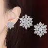Venta Caliente AliExpress Venta Caliente Pendientes de Flor de Sol Chapados en Plata con Circonita Estilo Japonés y Coreano Femenino Pendientes Completos de Diamante Ojo de Caballo Copo de Nieve