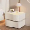 Mesa de noche color crema 2025 Dormitorio Hogar Creativo Nuevo Moderno Simple Gama Alta Madera Maciza Almacenamiento de Mesita de Noche Estilo Nuevo