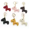 Colgante original de caballo lindo para el Año del Caballo, muñeca de cuero estilo miu en colores macarrón, dijes para bolso al por mayor