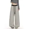 Calça casual de tricô listrada color-block estilo americano para mulheres, corte solto e relaxado, silhueta que valoriza o corpo, perna larga, calça longa versátil de perna reta para o outono