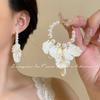 Aretes Colgantes de Jardín Sombra Flotante Super Hada Retro Francés Perla Pétalo Borla Lujo Ligero Alta Gama Diseño Nicho