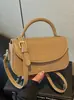 Bolso pequeño cuadrado retro de alta calidad, versátil, de nicho para mujer, bandolera, bolso cruzado, bolso de mano, nuevo y moderno, transfronterizo 2026