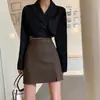 Falda Sexy de Cuero PU de Corte A Otoño y Primavera Nueva Tendencia Encanto Ins Moda Japonesa y Coreana Falda Corta Ajustada al Cuerpo Falda Midi Color Café
