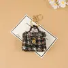 Estilo pequeño francés transfronterizo moda creativa mini bolso llavero colgante amuleto de bolso monedero funda para auriculares al por mayor mujer