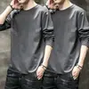Camiseta casual versátil de manga larga para hombre para otoño, cuello redondo, color liso moderno, cómoda, transpirable y de corte holgado.