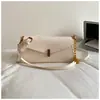 Bolsa de ombro simples e elegante estilo coreano única, novo modelo de verão 2026, bolsa quadrada pequena de alta aparência, bolsa de ombro estilosa de cor sólida