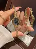 Nuevo producto más vendido: Pulsera con forma de bañera para mujer, reloj de pulsera de cuarzo para mujer, ovalado de moda con números romanos
