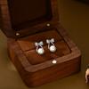 Primavera y verano nuevos aretes de lazo de diseño de moda coreana de plata S925, exquisitos aretes de perlas para oficina
